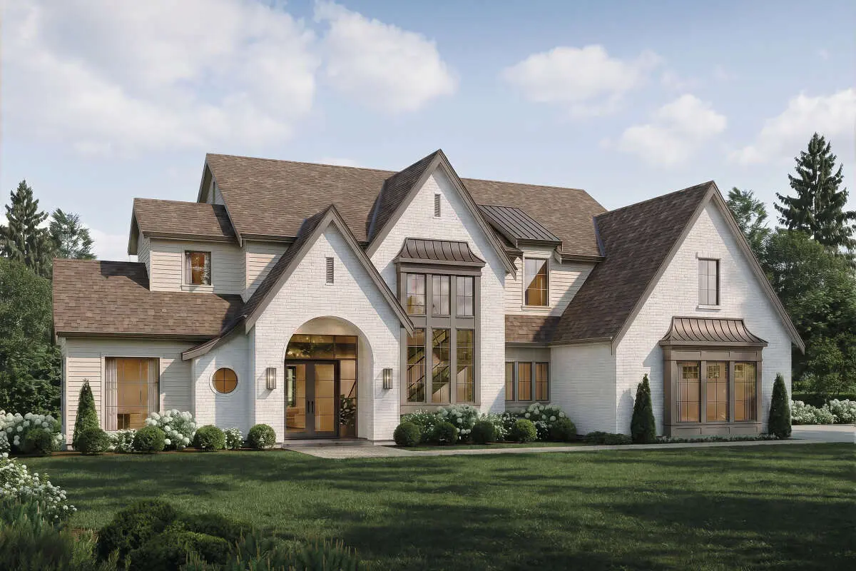 A large custom home on acreage in Cherokee County at golden hour